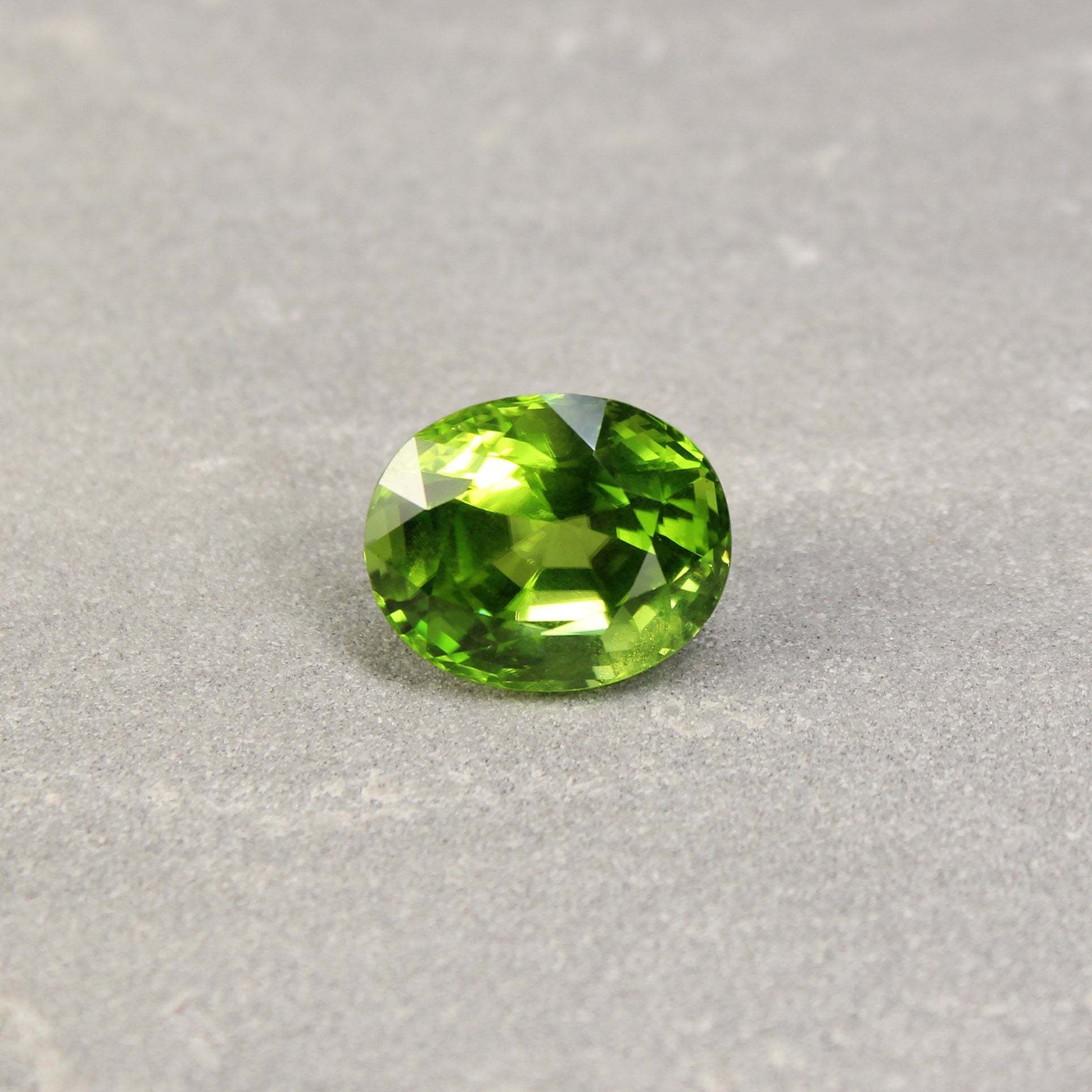 17.19ct Yellowish Green, Oval Peridot, Untreated - 16.90 x 13.73 x 11.25mm