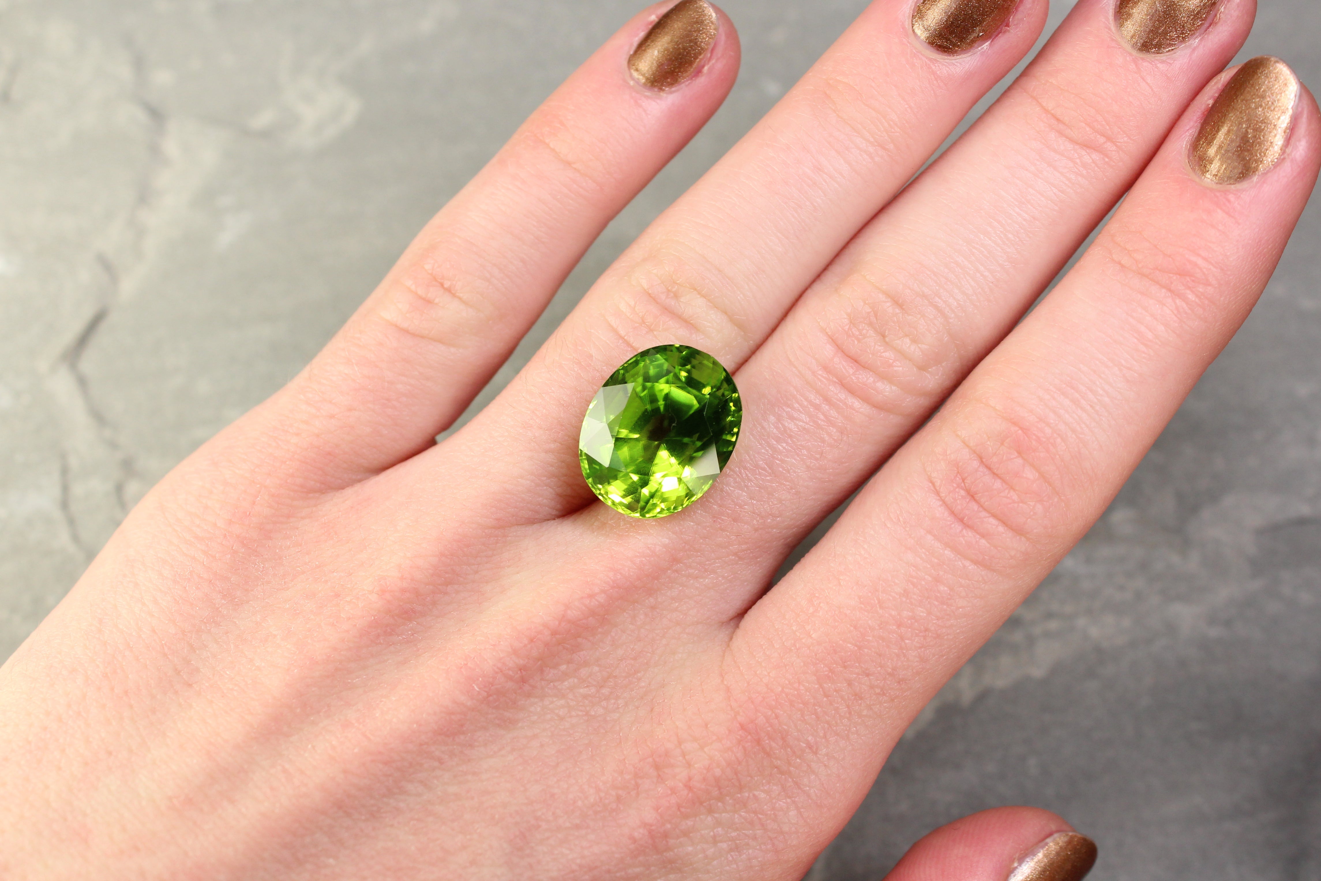 17.19ct Yellowish Green, Oval Peridot, Untreated - 16.90 x 13.73 x 11.25mm