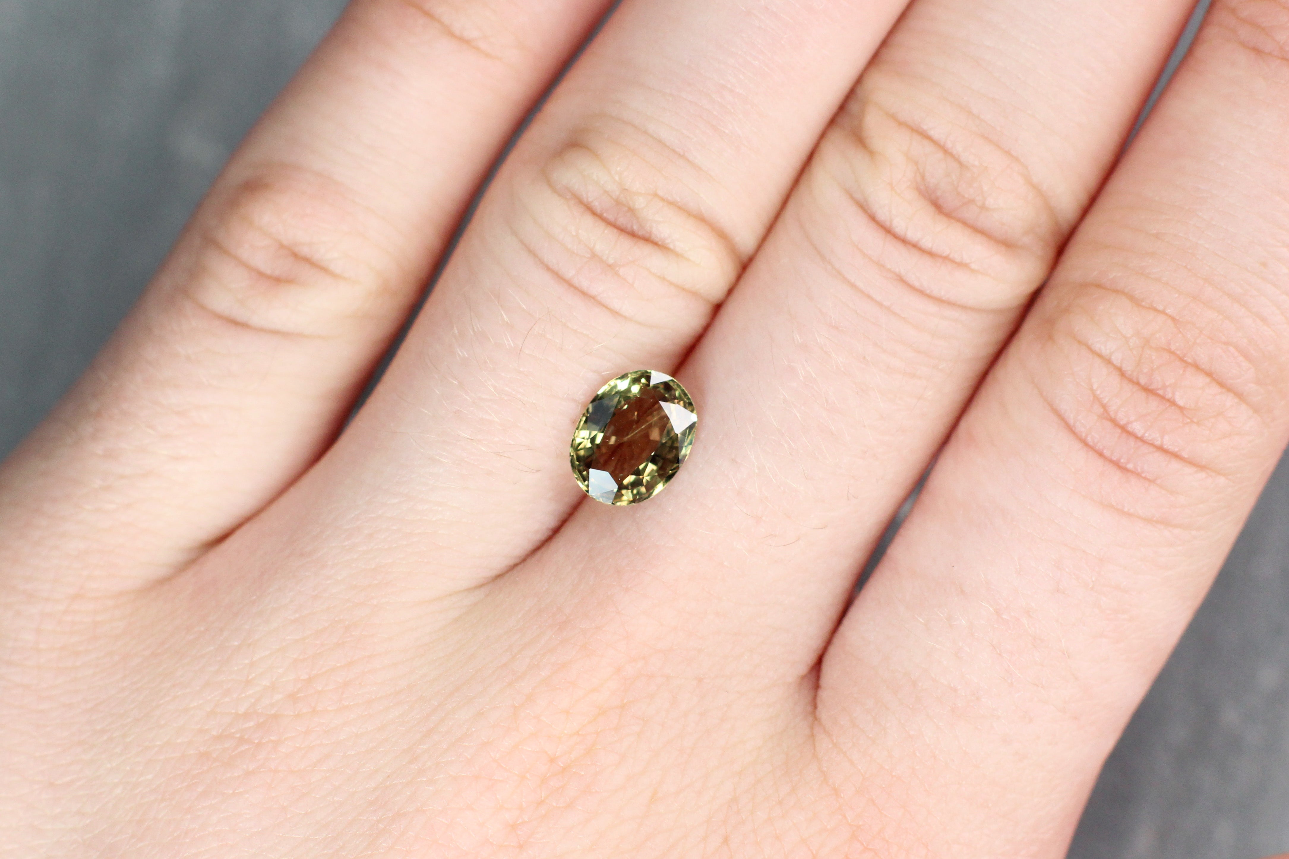 2.14ct Greenish Yellow, Oval Sapphire, No Heat, East Africa - 8.98 x 6.96 x 3.77mm