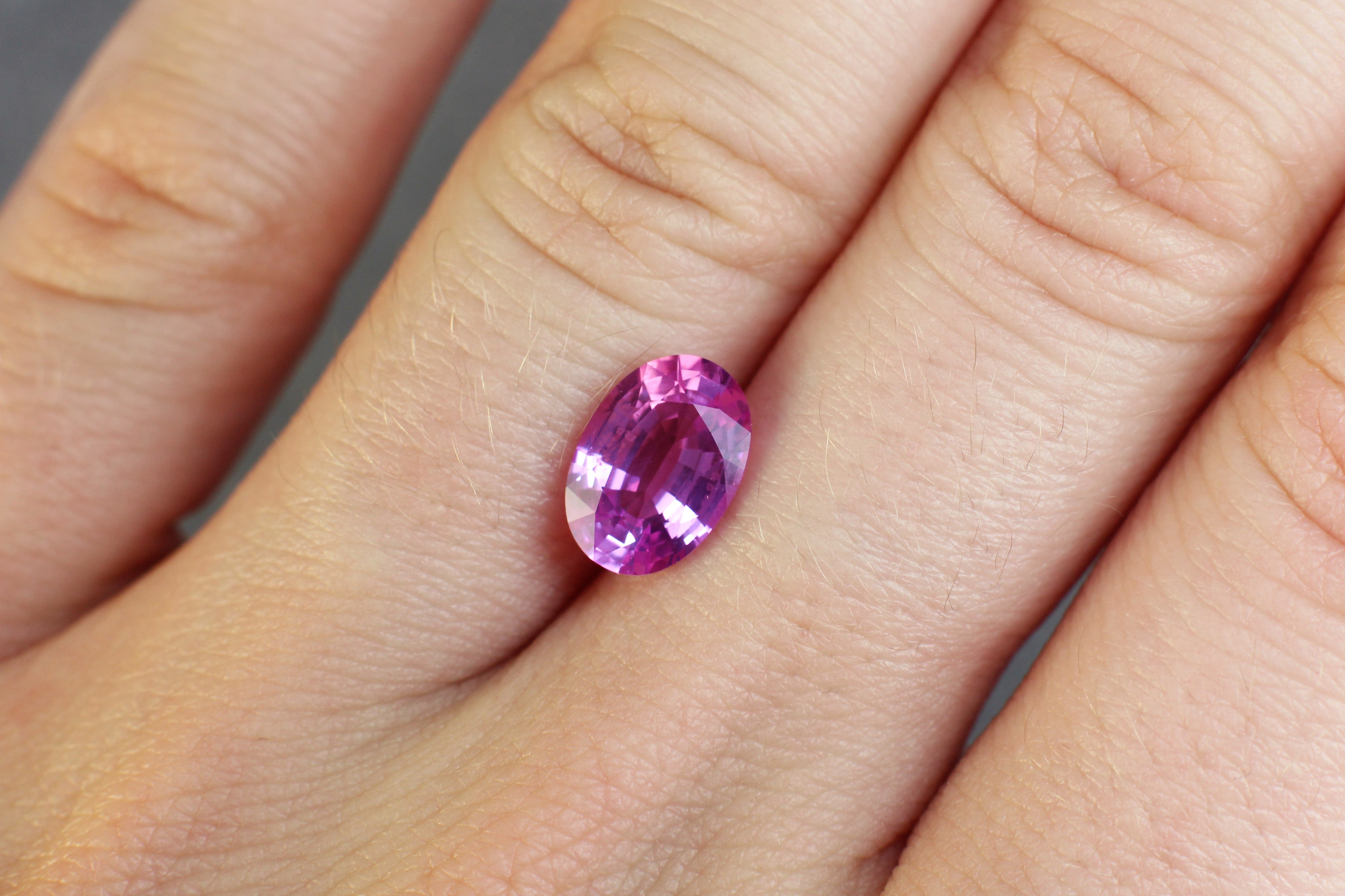 2.46ct Purplish Pink, Oval Sapphire, Sri Lanka - 9.70 x 6.83 x 4.14mm