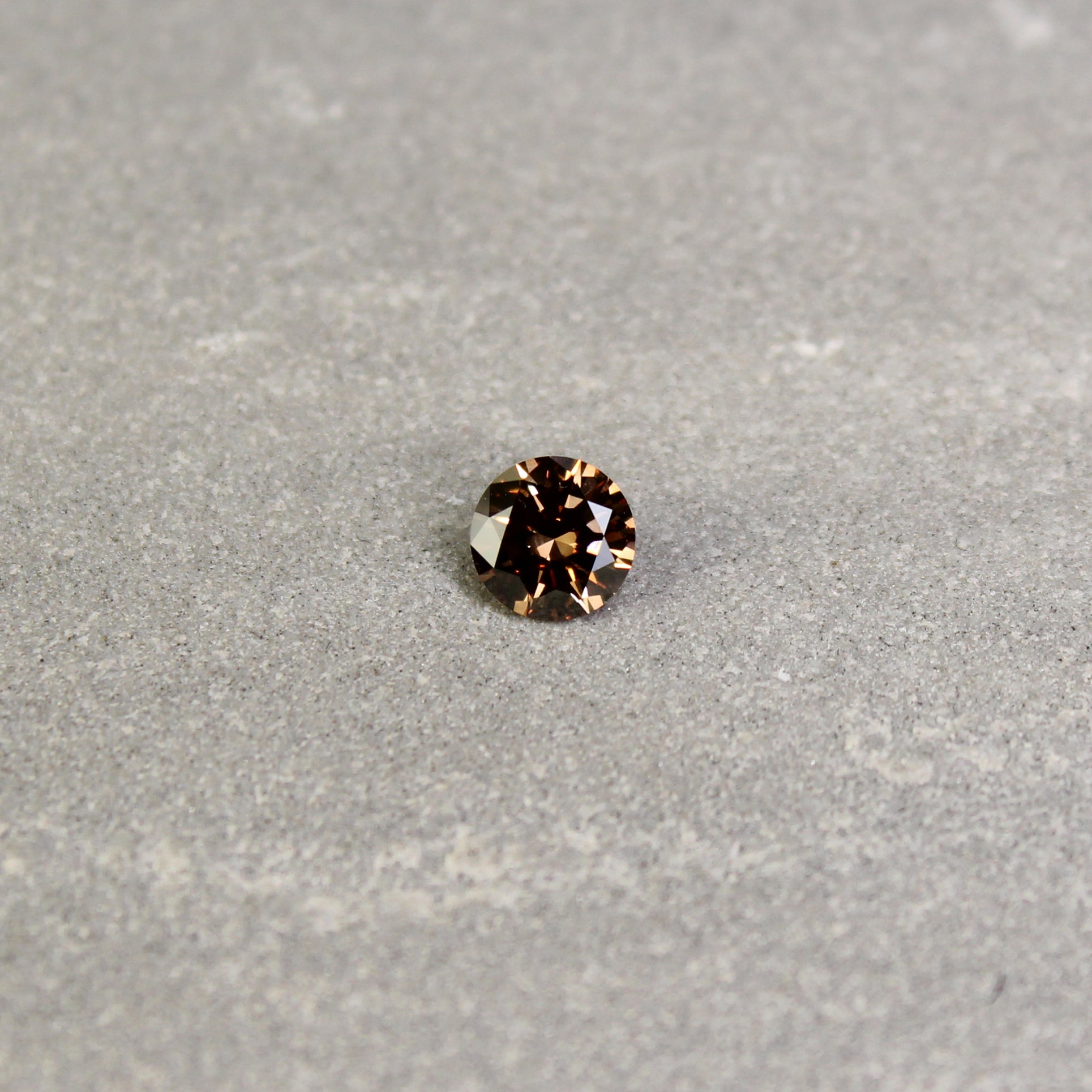 0.60ct Deep Brown, Round Diamond, SI1 - 5.54 - 5.59 x 3.23mm