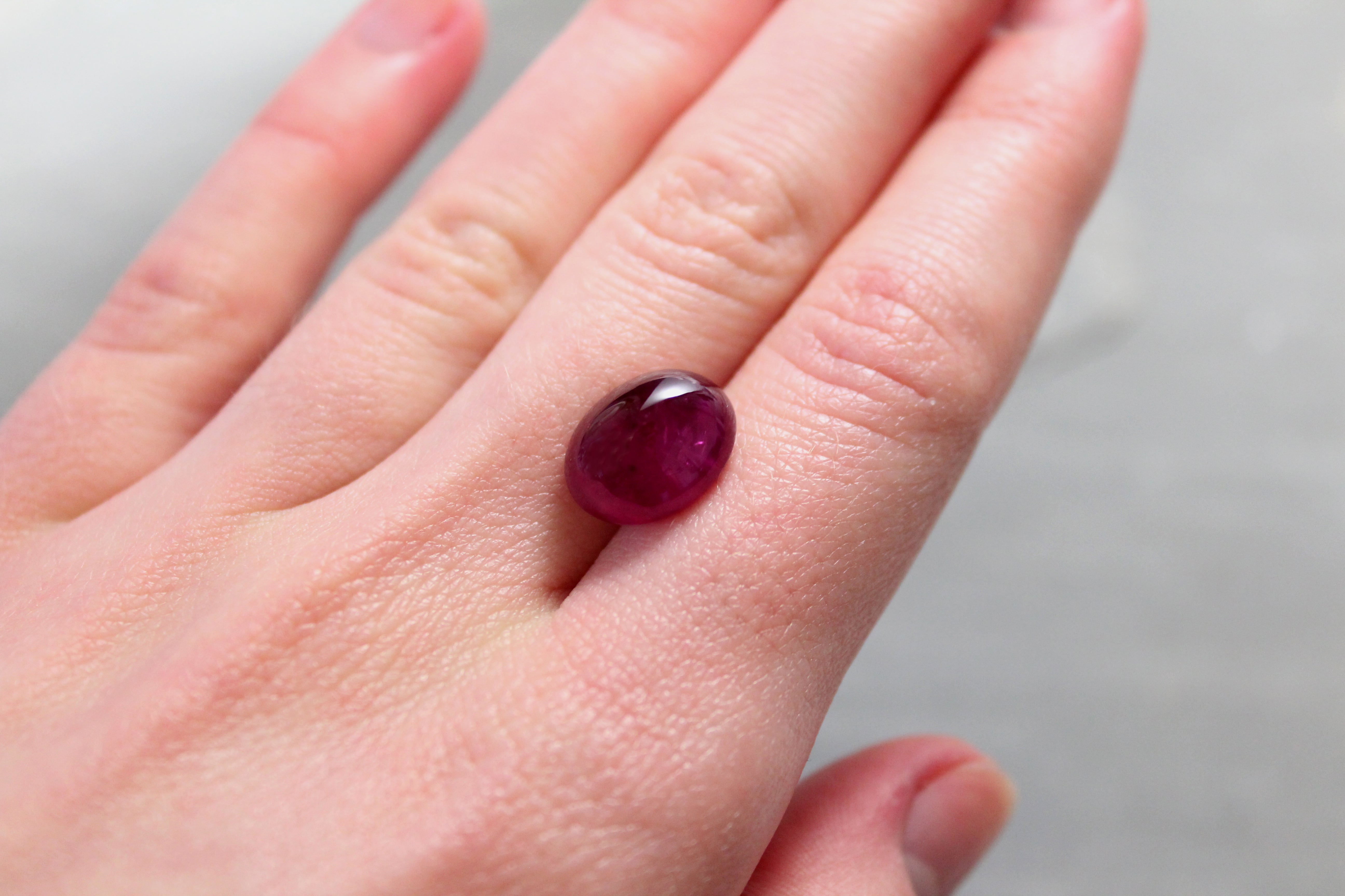 10.55ct Purplish Red, Oval Cabochon Ruby, Myanmar - 13.14 x 10.40 x 7.63mm