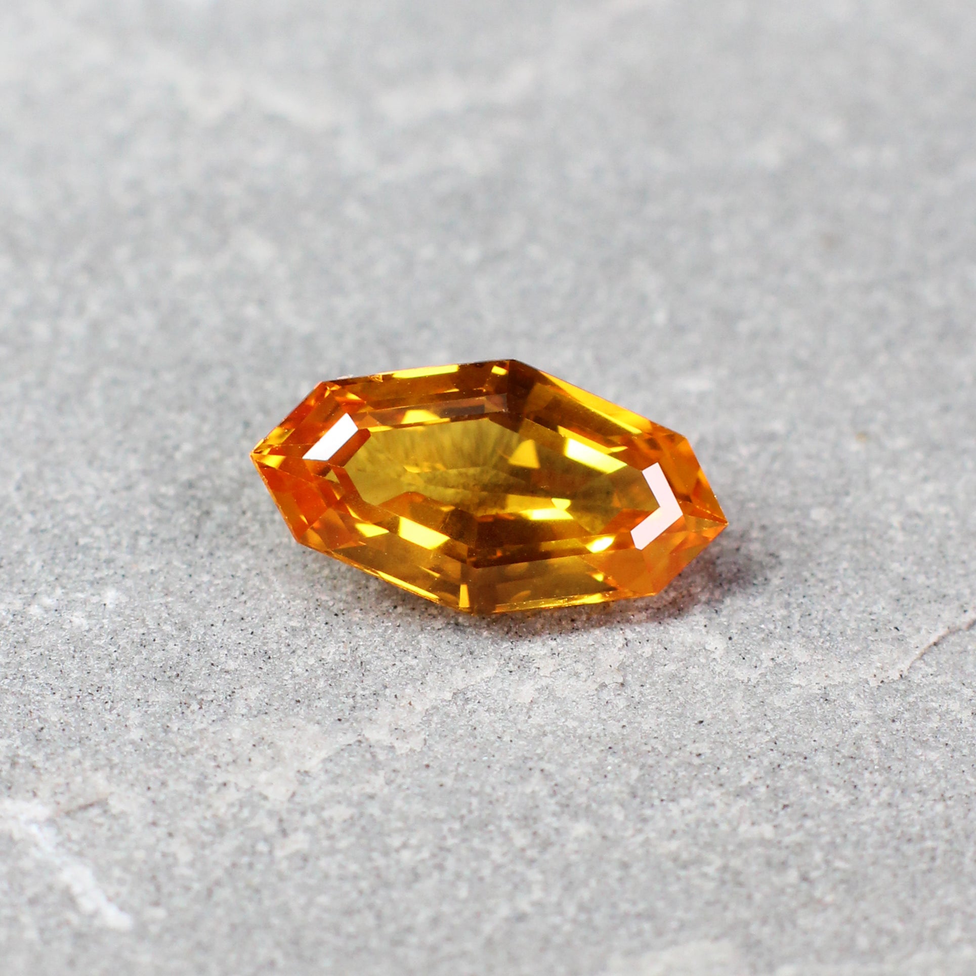 3.27ct Orangy Yellow, Kite Shape Sapphire, Heated, East Africa - 13.20 x 7.12 x 4.41 mm