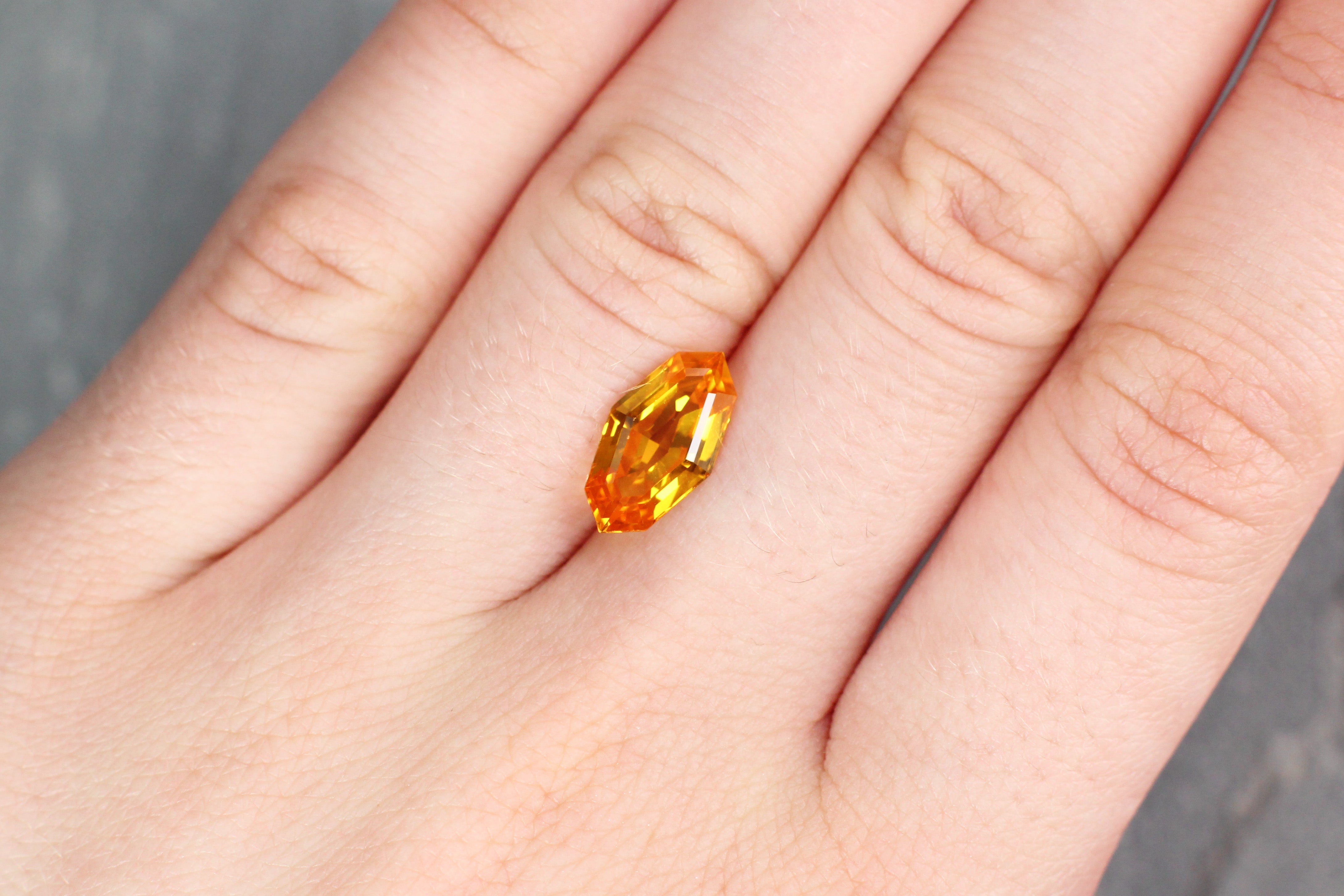 3.27ct Orangy Yellow, Kite Shape Sapphire, Heated, East Africa - 13.20 x 7.12 x 4.41 mm